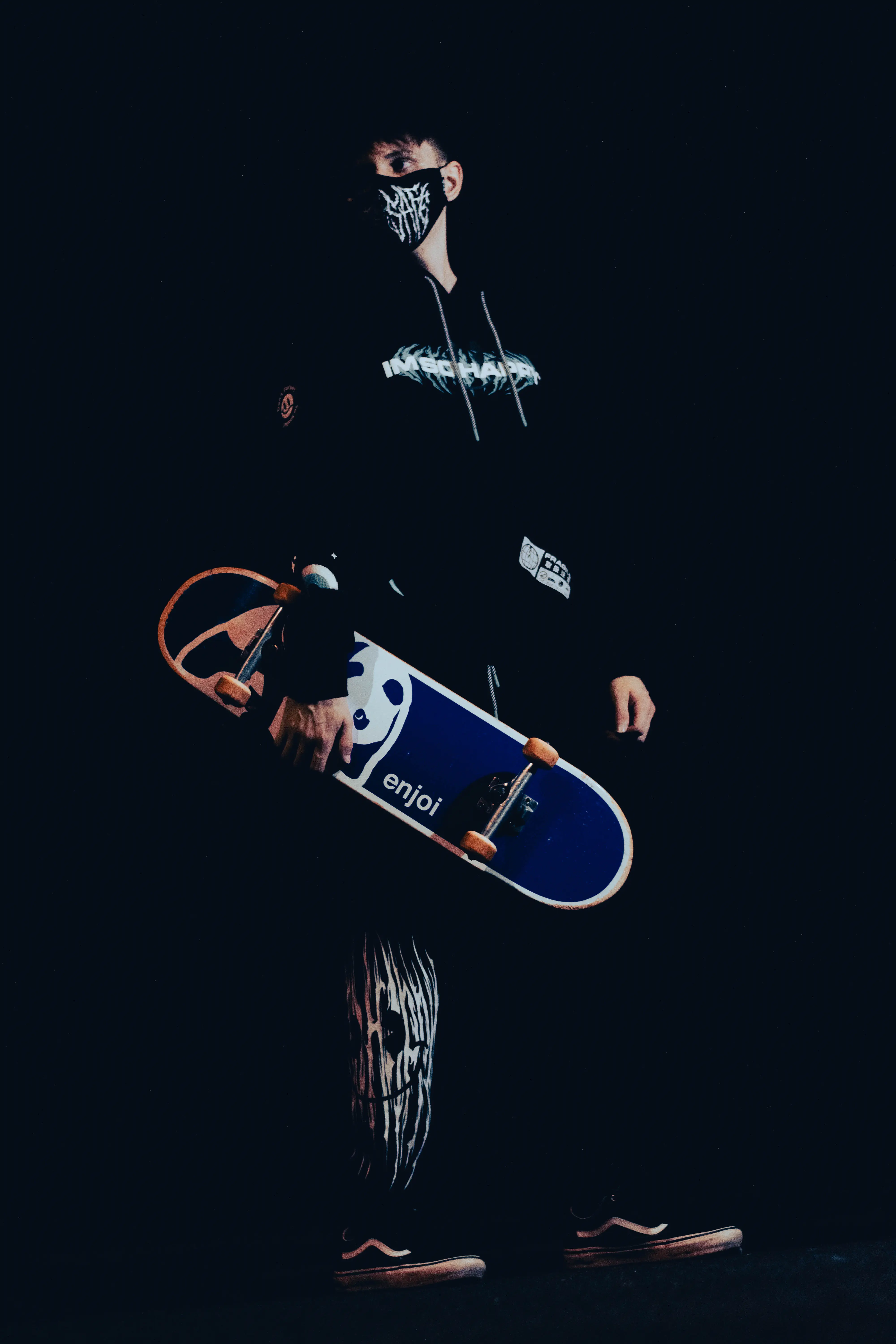 Jacob Levers, photographer, with a skateboard